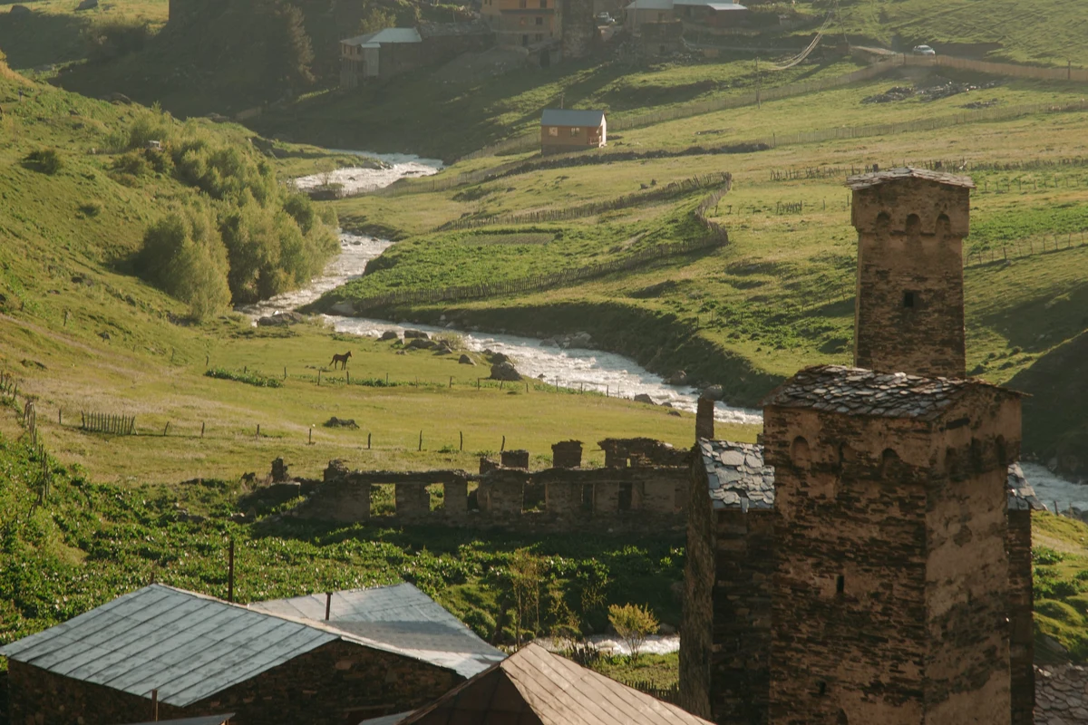 Ancient stone watchtowers and traditional village in the Georgian highlands, characteristic of the Tusheti and Khevsureti highland corridor on the Omalo to Shatili trek route
