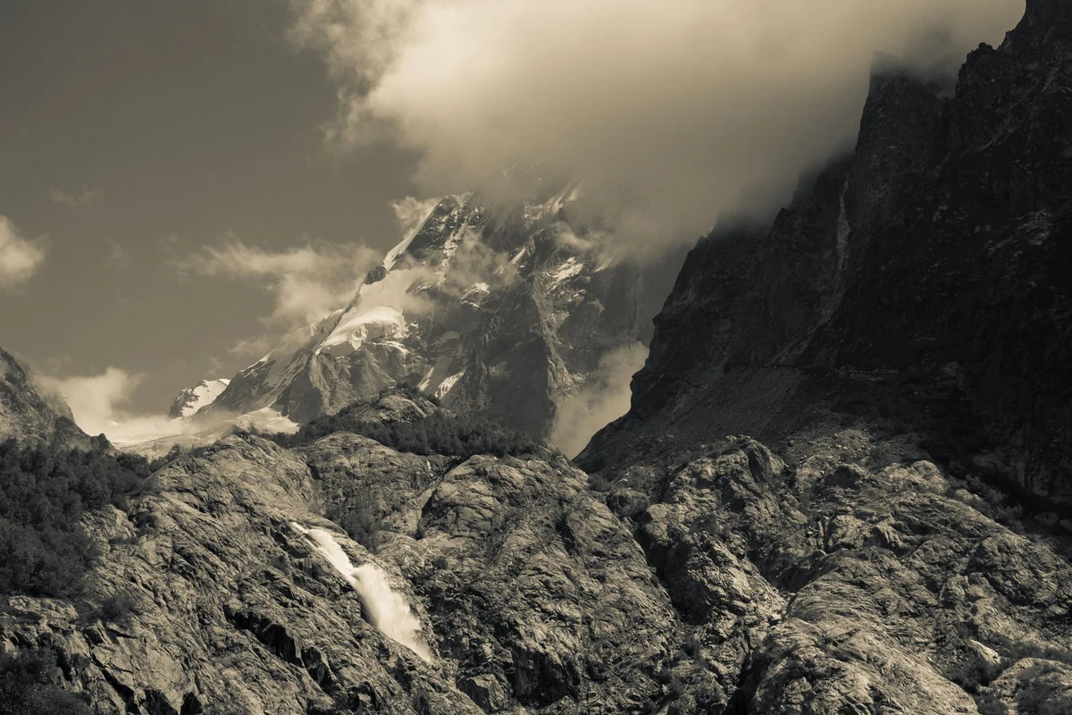 Waterfall cascading through rugged Svaneti mountain landscape, Georgia